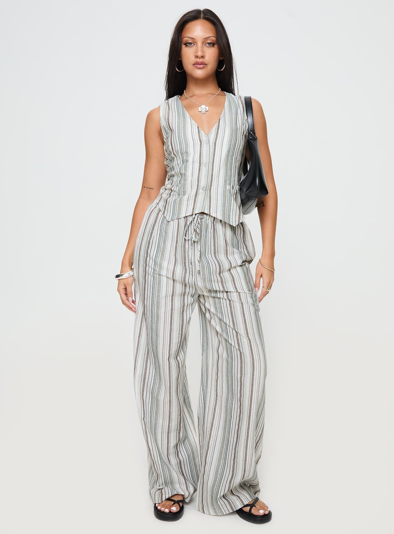 front view of model wearing Princess Polly Flutters Vest Top White / Blue Stripe Sleeveless V-Neck 