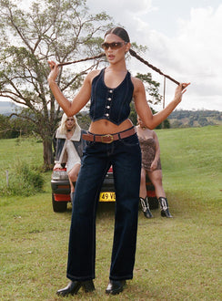 Front view of model wearing  front Princess Polly Low Rise Jeans  Willson Mid Rise Jeans Dark Wash Denim