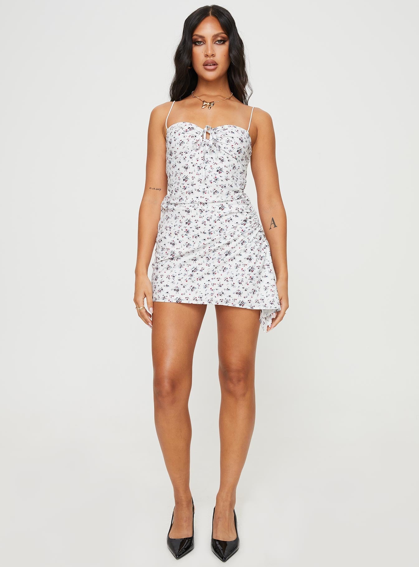 Floral mini dress Elasticated shoulder straps, sweetheart neckline, tie fastening at bust, invisible zip fastening at side, adjustable ruching at side
