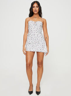 Floral mini dress Elasticated shoulder straps, sweetheart neckline, tie fastening at bust, invisible zip fastening at side, adjustable ruching at side