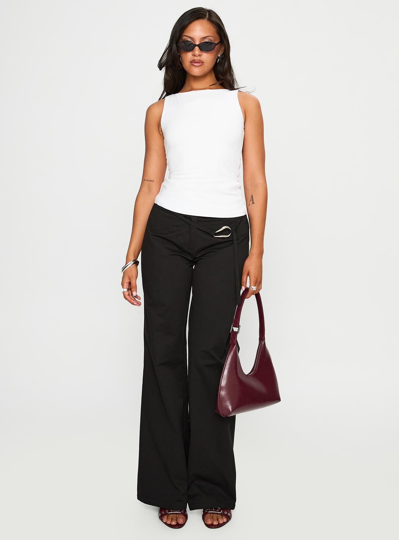 side view of model wearing Princess Polly Lucetta Wide Leg Pant Black Low Rise Pants 