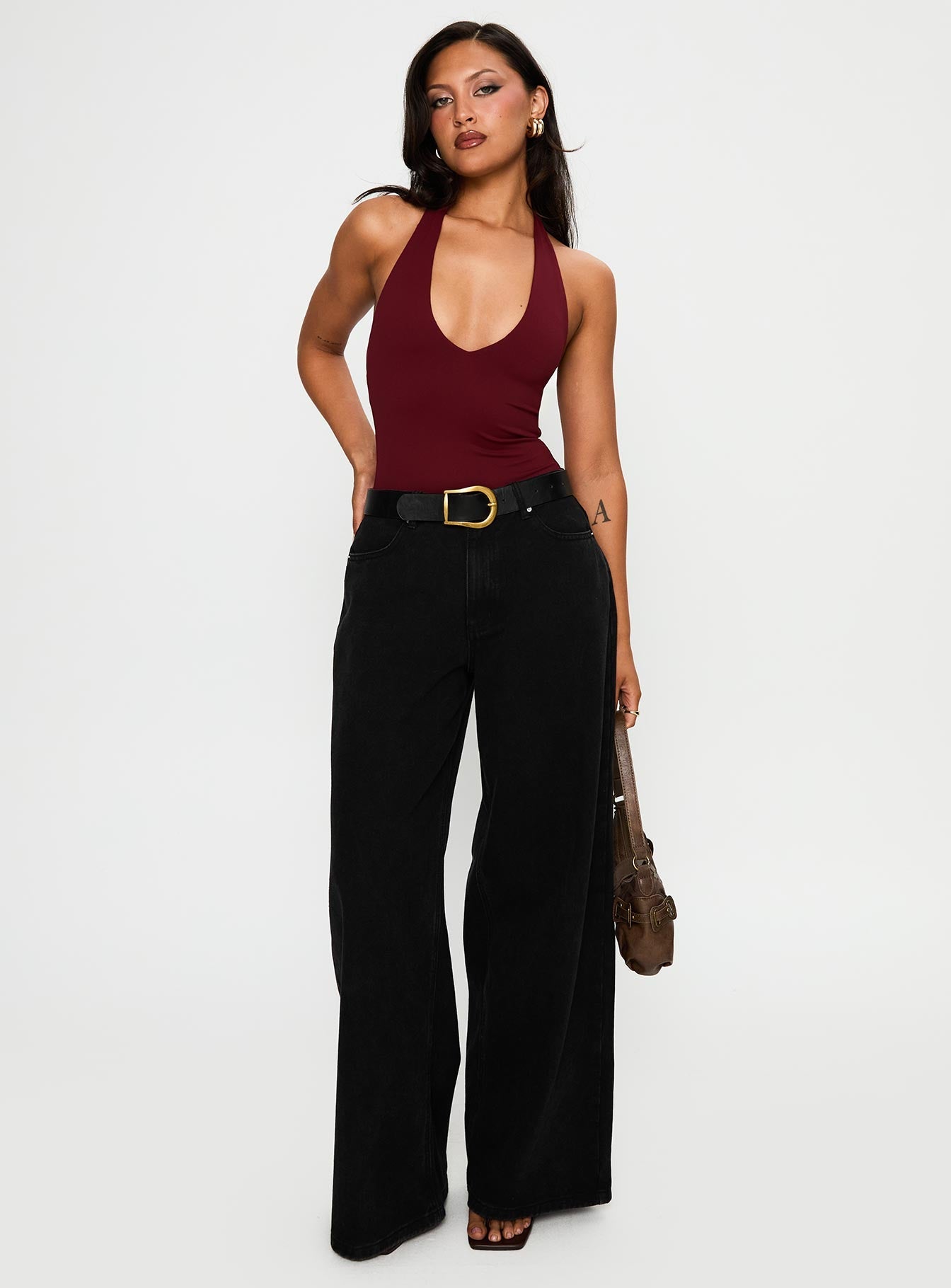 front view of model wearing Princess Polly Someone New Halter Bodysuit Burgundy Sleeveless 