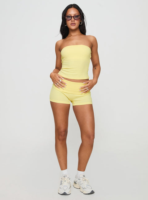 front view of model wearing Princess Polly Baseline Low Rise Rib Shorts Yellow Low Rise Shorts 