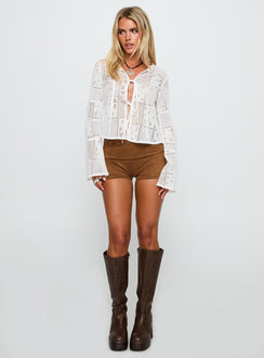 side view of model wearing Princess Polly Mine For Life Crochet Long Sleeve Top White Full Sleeves Crew Neck 