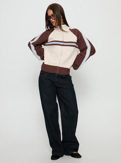 front view of model wearing Princess Polly Korinne Low Rise Bootleg Jeans Indigo Low Rise Jeans 