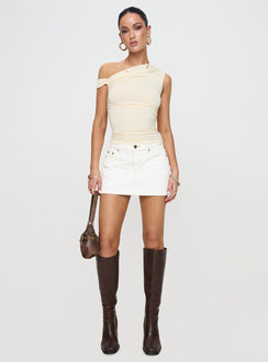   front view of model wearing Princess Polly Nicolina Low Rise Denim Mini Skirt Ecru Mini Skirts 