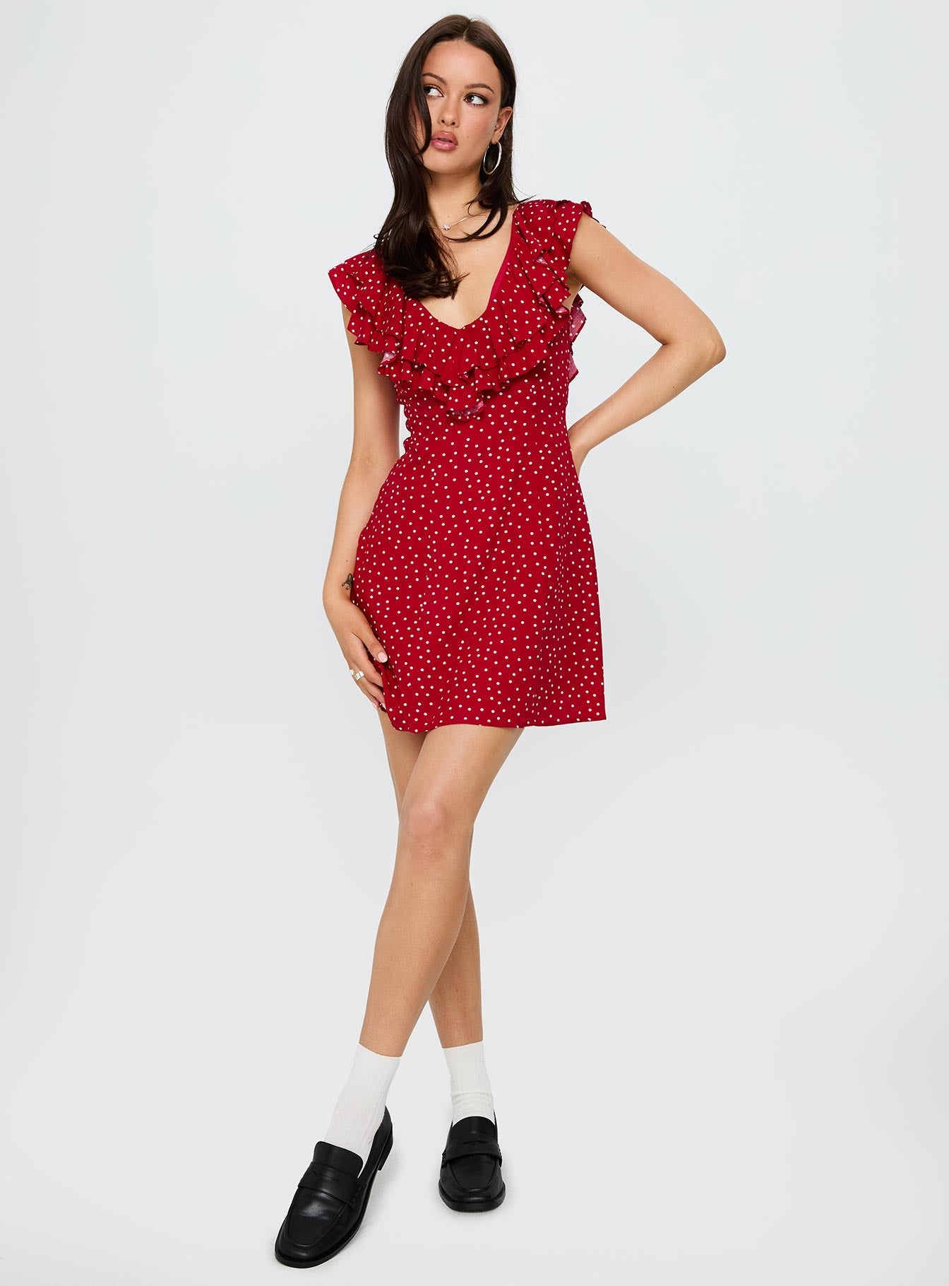 side view of model wearing Princess Polly Cherry Schnapps Flutter Mini Dress Red Polka V-Neck 
