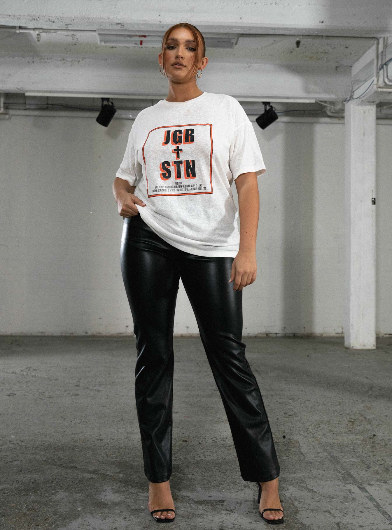 Front view of model wearing  front Princess Polly Short Sleeves High Neck  JGR & STN Feat. Oversized Tee White