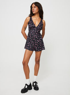 Floral romper V-neckline, slight ruching at bust, invisible zip and tie fastening at back