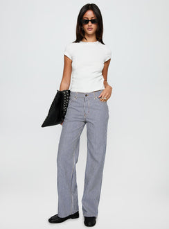 front view of model wearing Princess Polly Top Model Jean Navy Stripe Low Rise Pants 