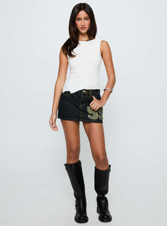   side view of model wearing Princess Polly Standout Patch Detail Denim Skort Blue Mini Skirts Skirts 