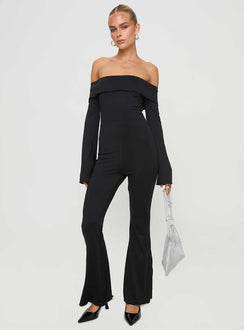 Jumpsuit Off-the-shoulder style, inner silicone strip at bust, flared sleeves with split, frill detail at bust, flared leg Good stretch, fully lined  Princess Polly Lower Impact 