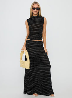   front view of model wearing Princess Polly Ford Maxi Skirt Onyx Polka Maxi 