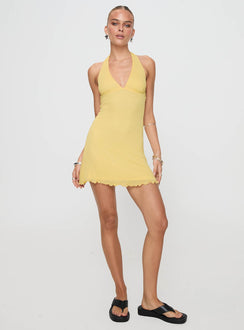 front view of model wearing Princess Polly Leam Mini Dress Butter Petite Plunger 