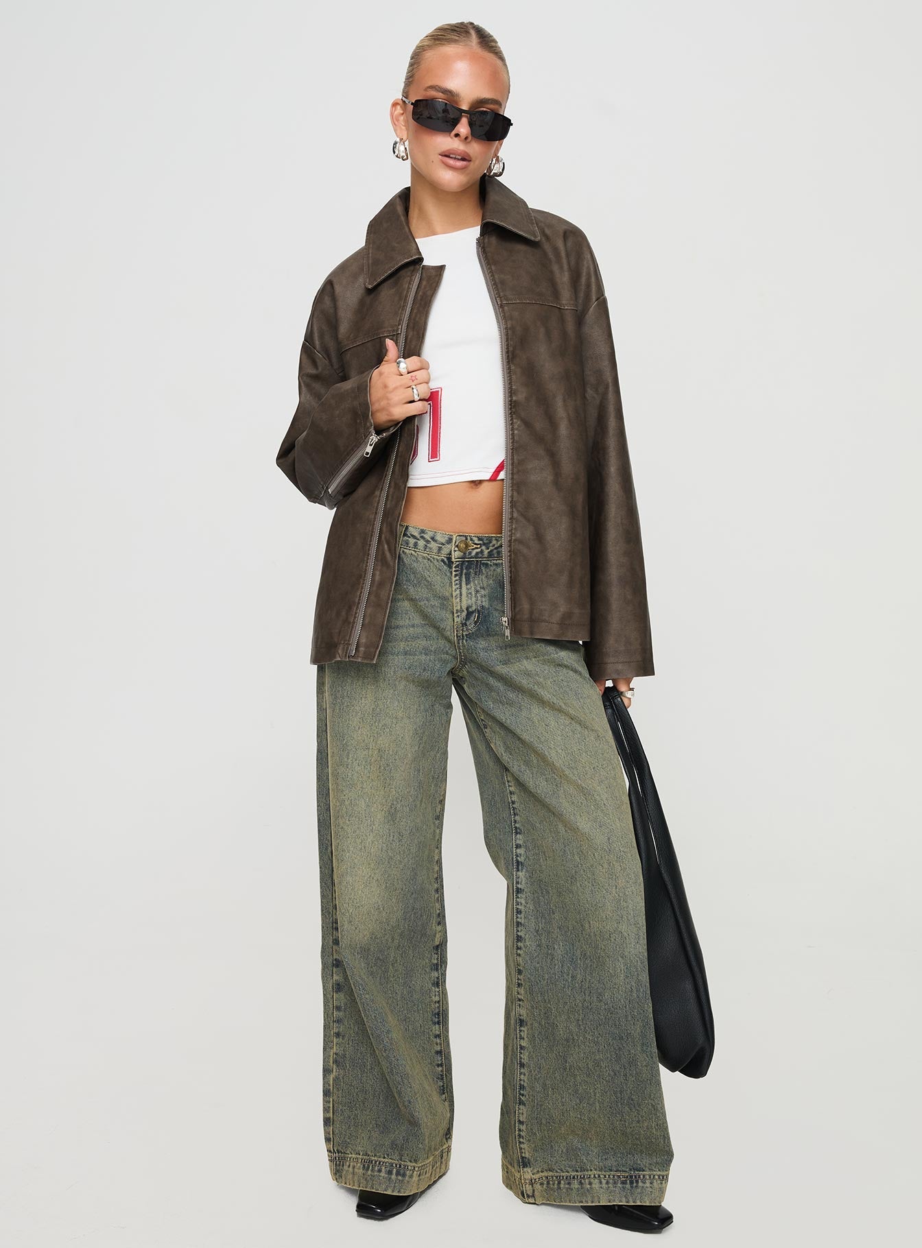 Faux leather jacket Oversized fit, classic collar, drop shoulder, zip fastening, twin hip pockets Good stretch, fully lined 