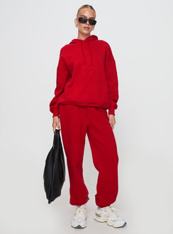 front view of model wearing Princess Polly Dream Fleece Ankle Cuff Sweatpants Red High Waisted Pants 