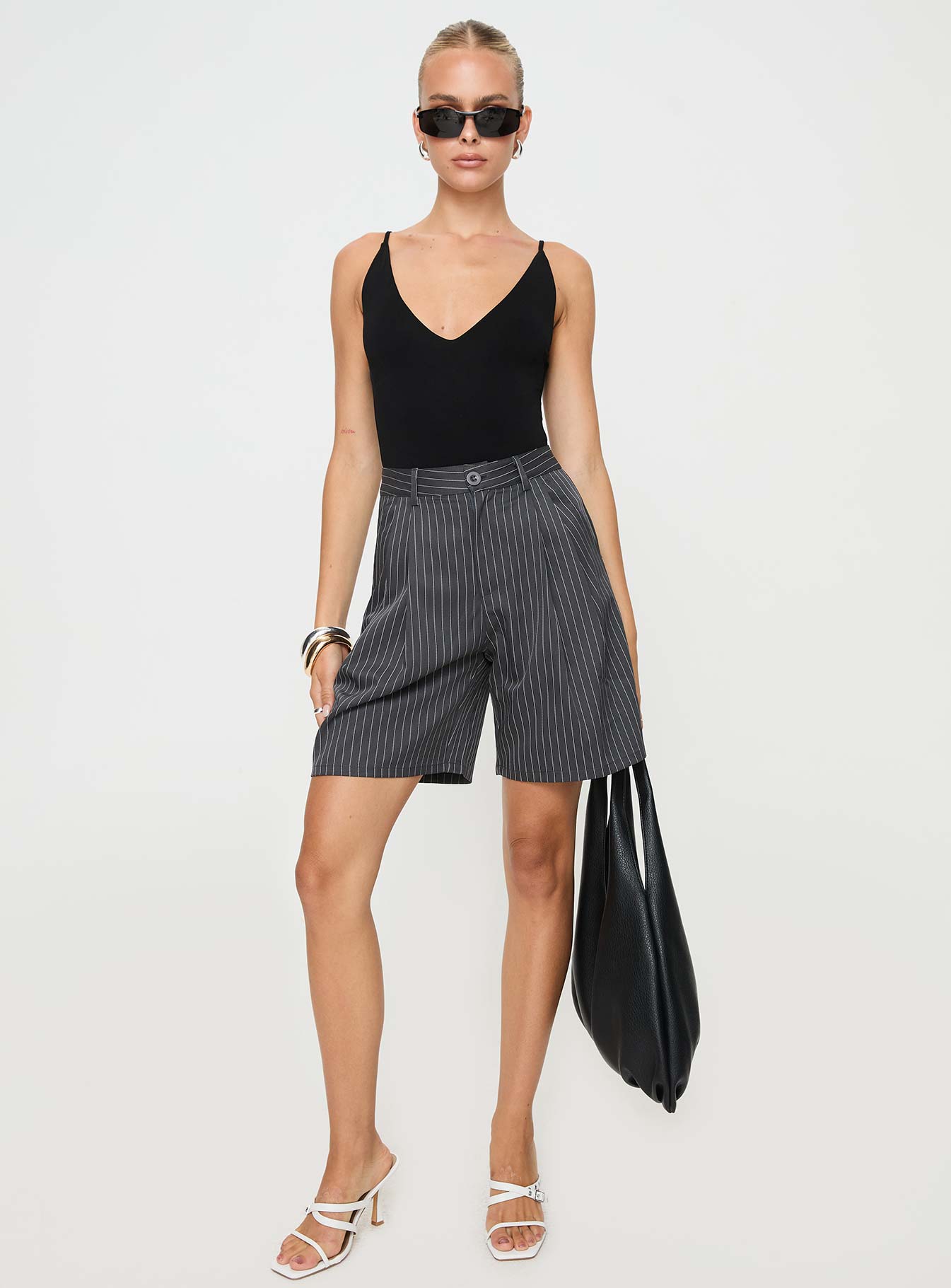 Black Bodysuit Deep v neckline, fixed shoulder straps, high cut leg, cheeky style bottom, press clip fastening