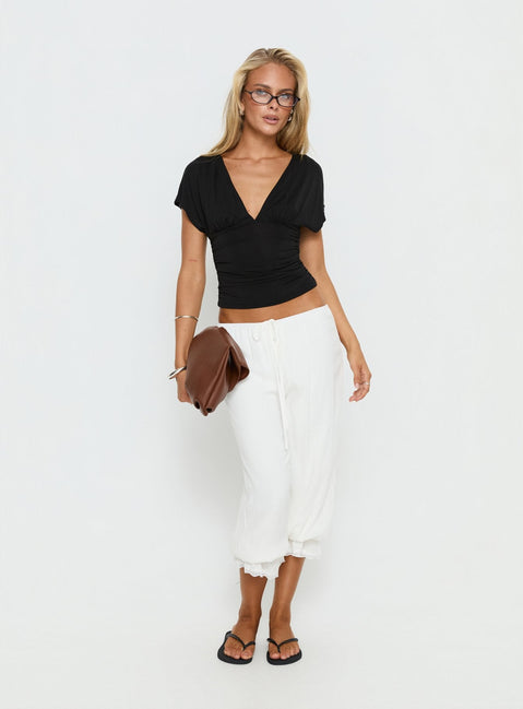 front view of model wearing Princess Polly Basma Bloomer Trouser Pants Rayon White Mid Rise Pants 