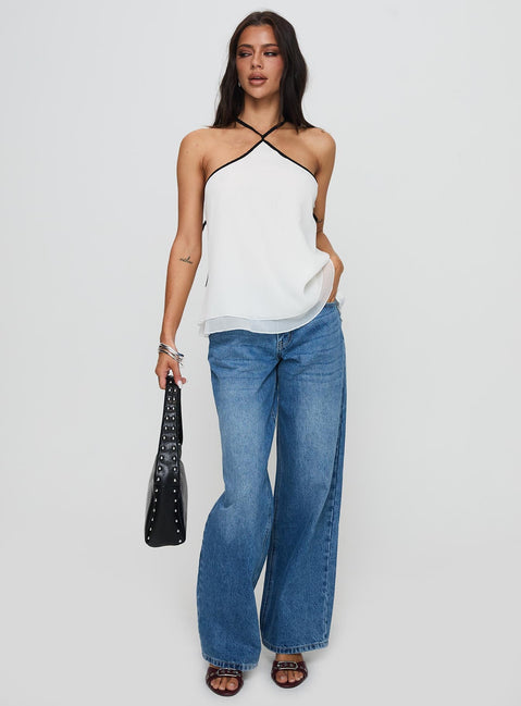 front view of model wearing Princess Polly Rafaella Halter Top Cream Sleeveless Asymmetric Neckline 