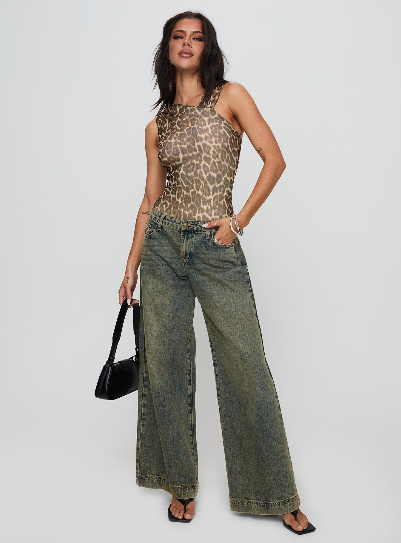 side view of model wearing Princess Polly Serenata Bodysuit Leopard Sleeveless 