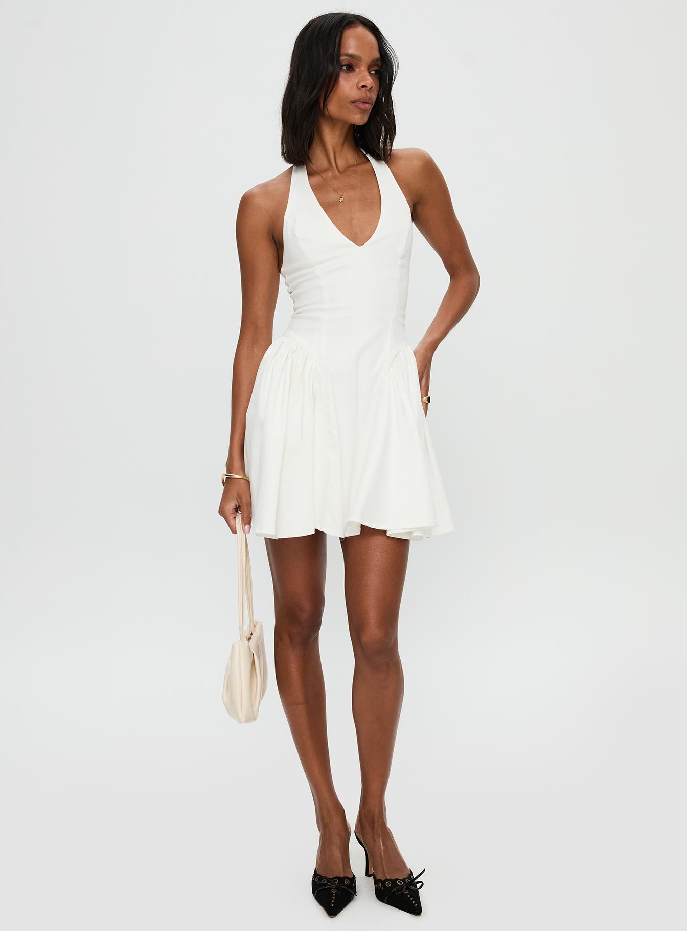 back view of model wearing Princess Polly Karisse Halter Mini Dress White Plunger 