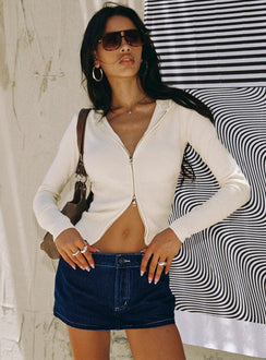 side view of model wearing Princess Polly Elingford Zip Up Hooded Sweater Cream 