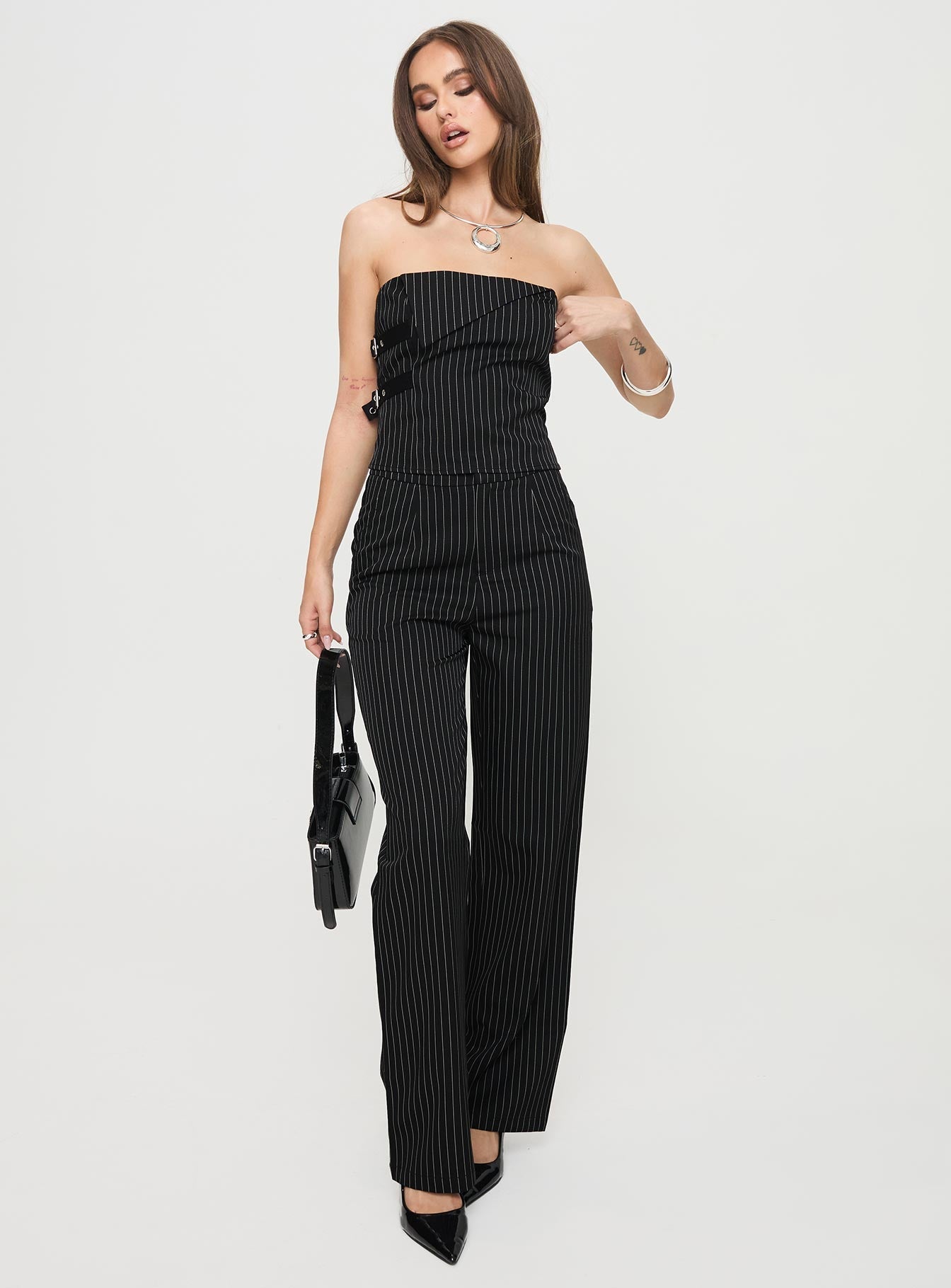 Pinstriped pants High rise fit, button & clasp fastening, twin hip pockets Non-stretch material, unlined 