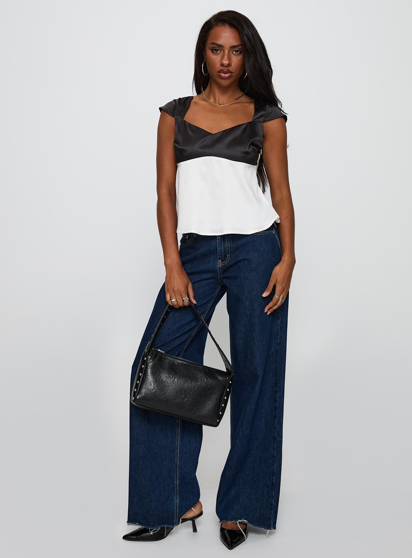 front view of model wearing Princess Polly Think About It Cap Sleeve Top Black / White Short Sleeves V-Neck 