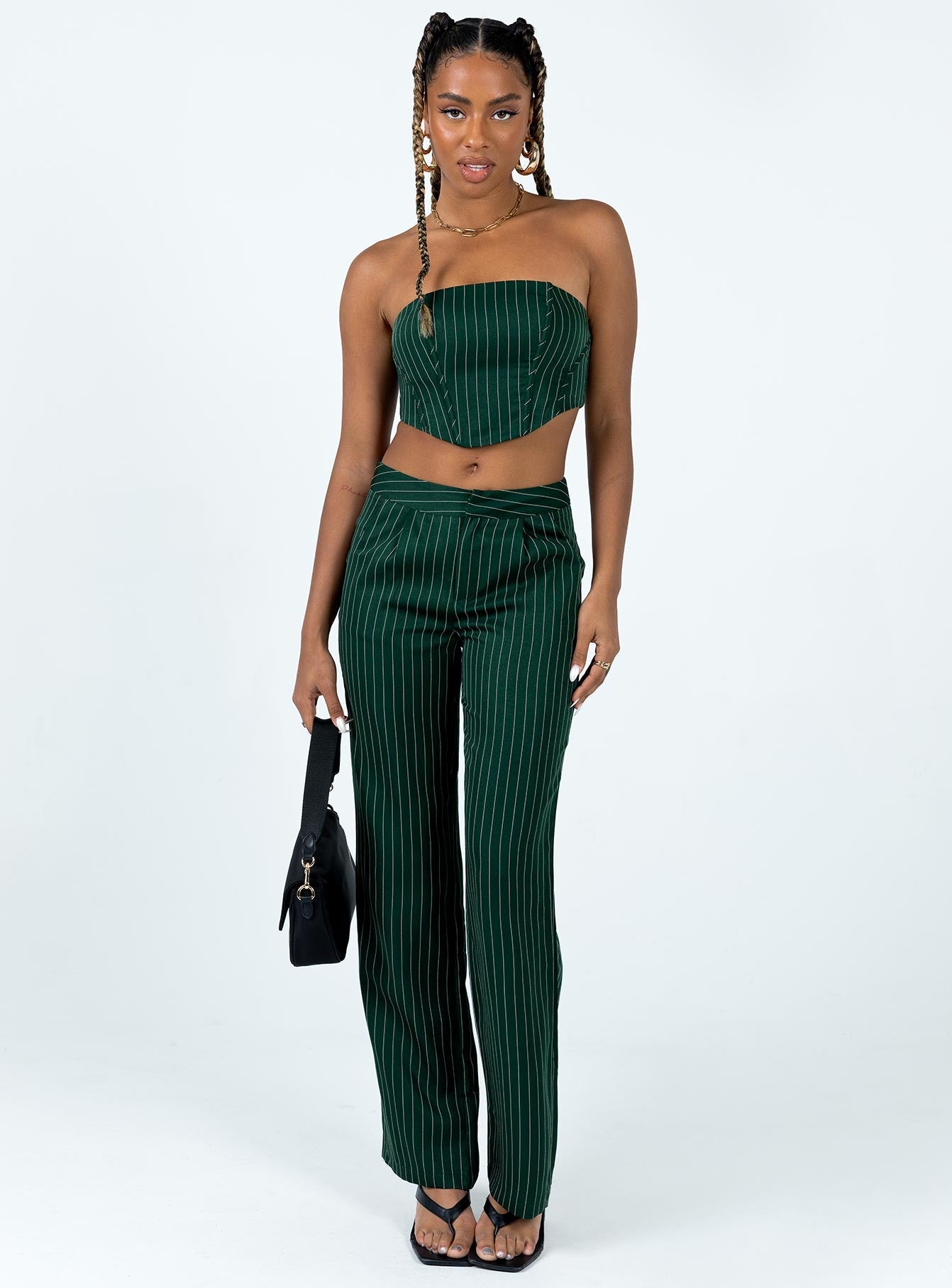 Matching set Pinstripe design Crop top Inner silicone strip Boning throughout Zip fastening at back Straight leg pants Clasp & zip fastening at front Twin hip pockets