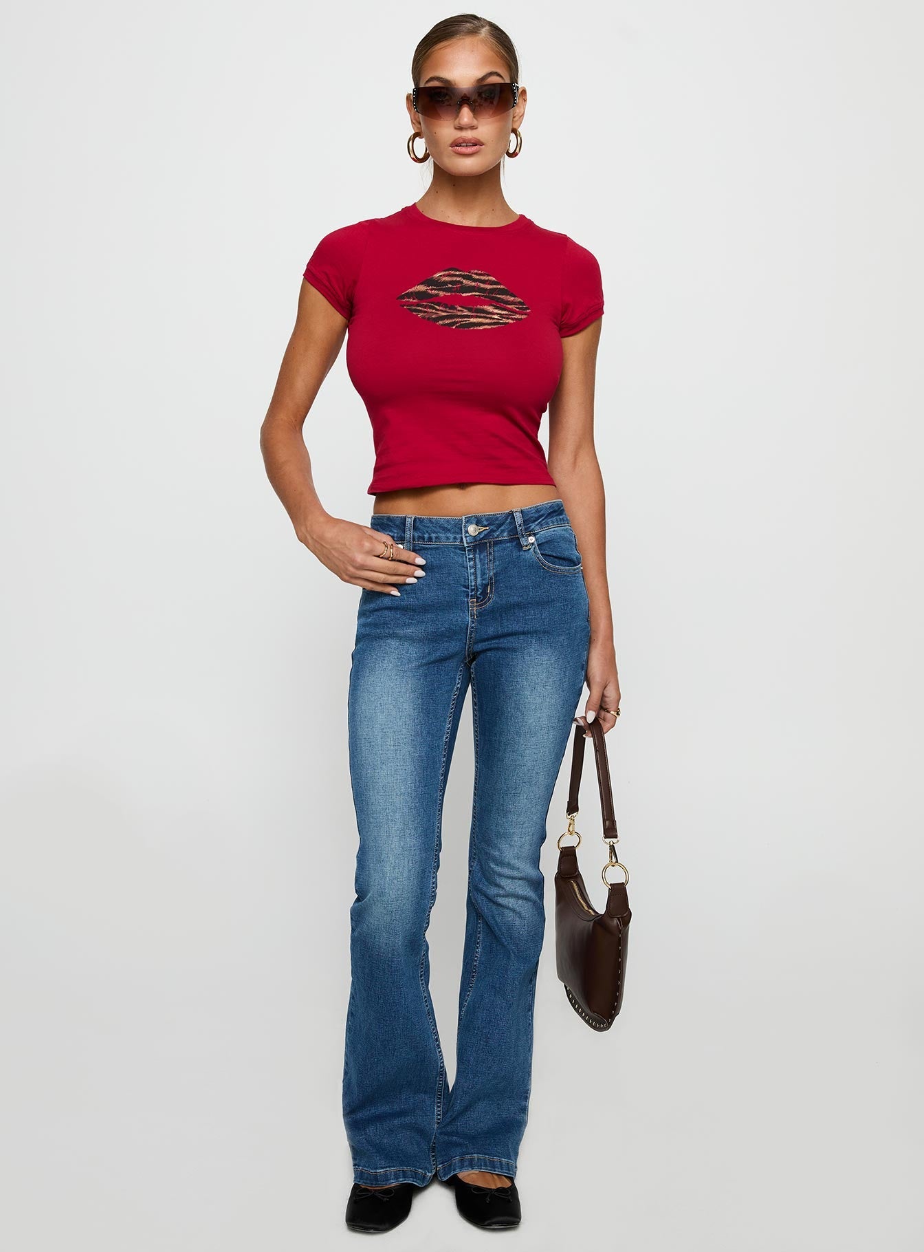 front view of model wearing Princess Polly Sutin Tee Red Short Sleeves Crew Neck 