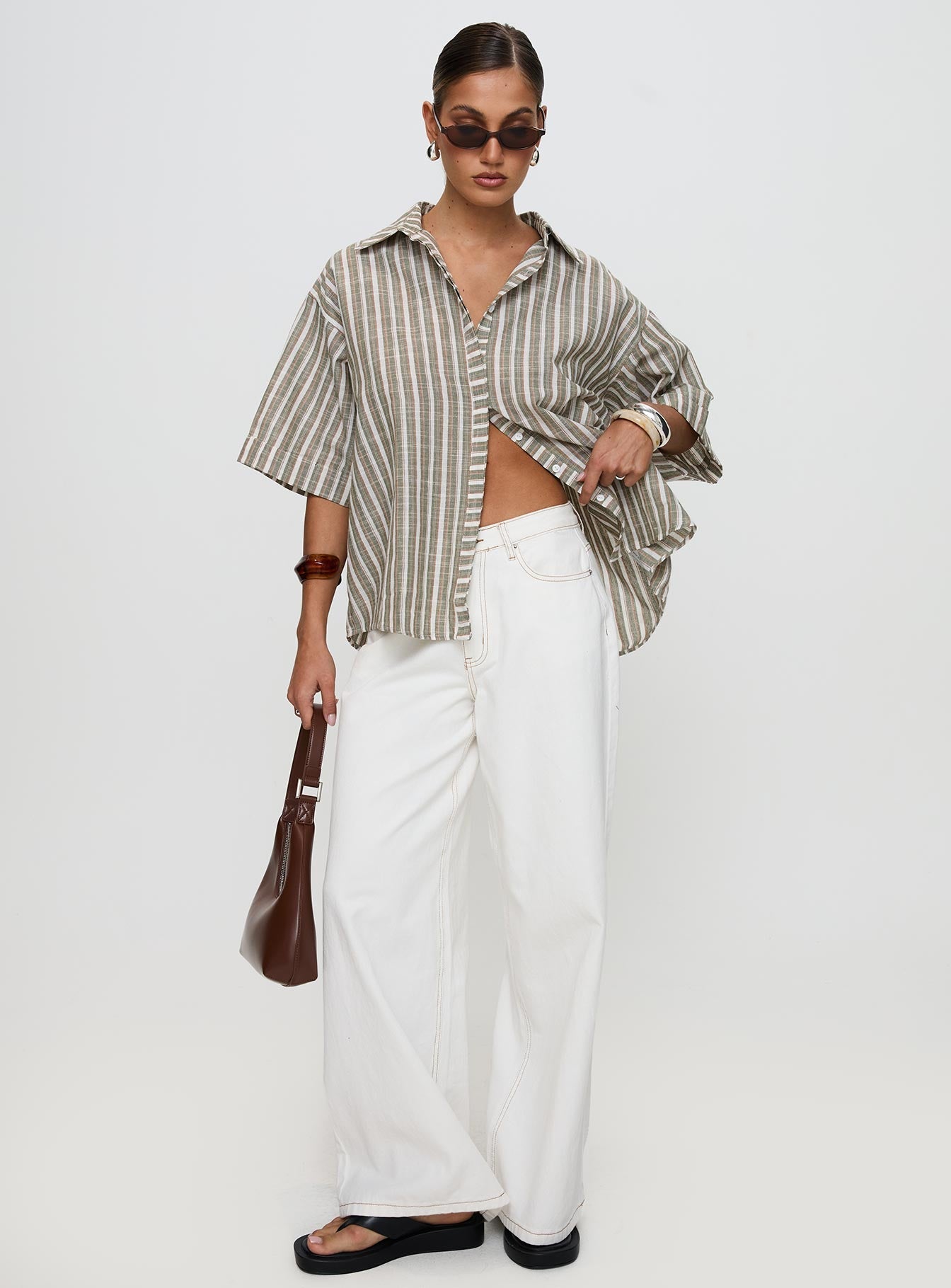 side view of model wearing Princess Polly Qualley Top Multi Half Sleeves V-Neck 