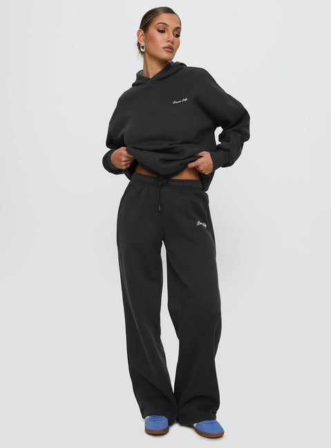 back view of model wearing Princess Polly Princess Polly Hooded Sweatshirt Bubble Script Grey 