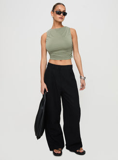 front view of model wearing Princess Polly Hold Em High Neck Top Green Sleeveless Crew Neck 