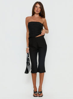 back view of model wearing Princess Polly Isalyn Tailored Capri Pants Black Pinstripe High Rise Pants 