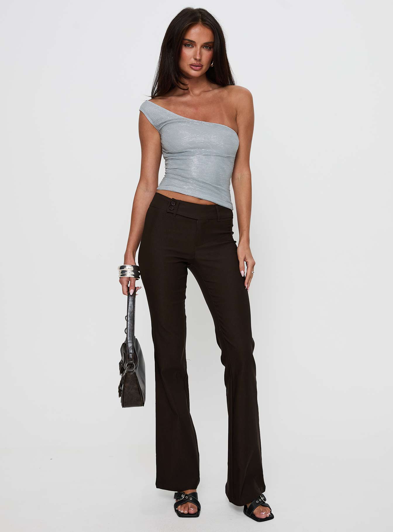 front view of model wearing Princess Polly Kinkirk Flared Pants Chocolate Tall Low Rise Pants 