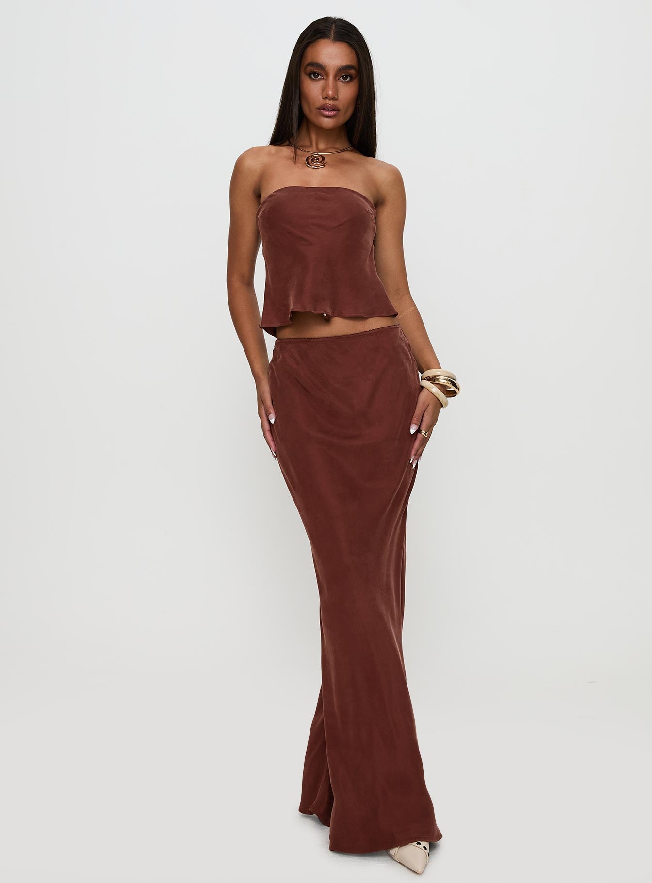  front view of model wearing Princess Polly Lucelia Maxi Skirt Brown Maxi 