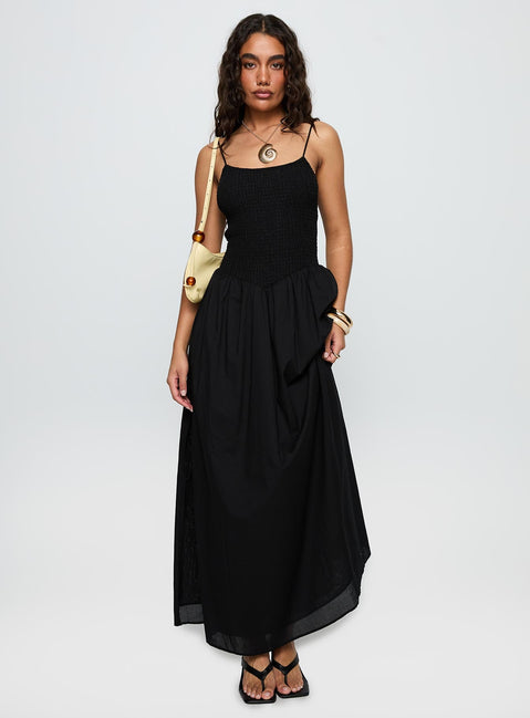 side view of model wearing Princess Polly Carys Maxi Dress Black Square Neck 