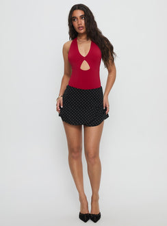   front view of model wearing Princess Polly Sonsie Mini Skirt Black / White Polka Mini Skirts 