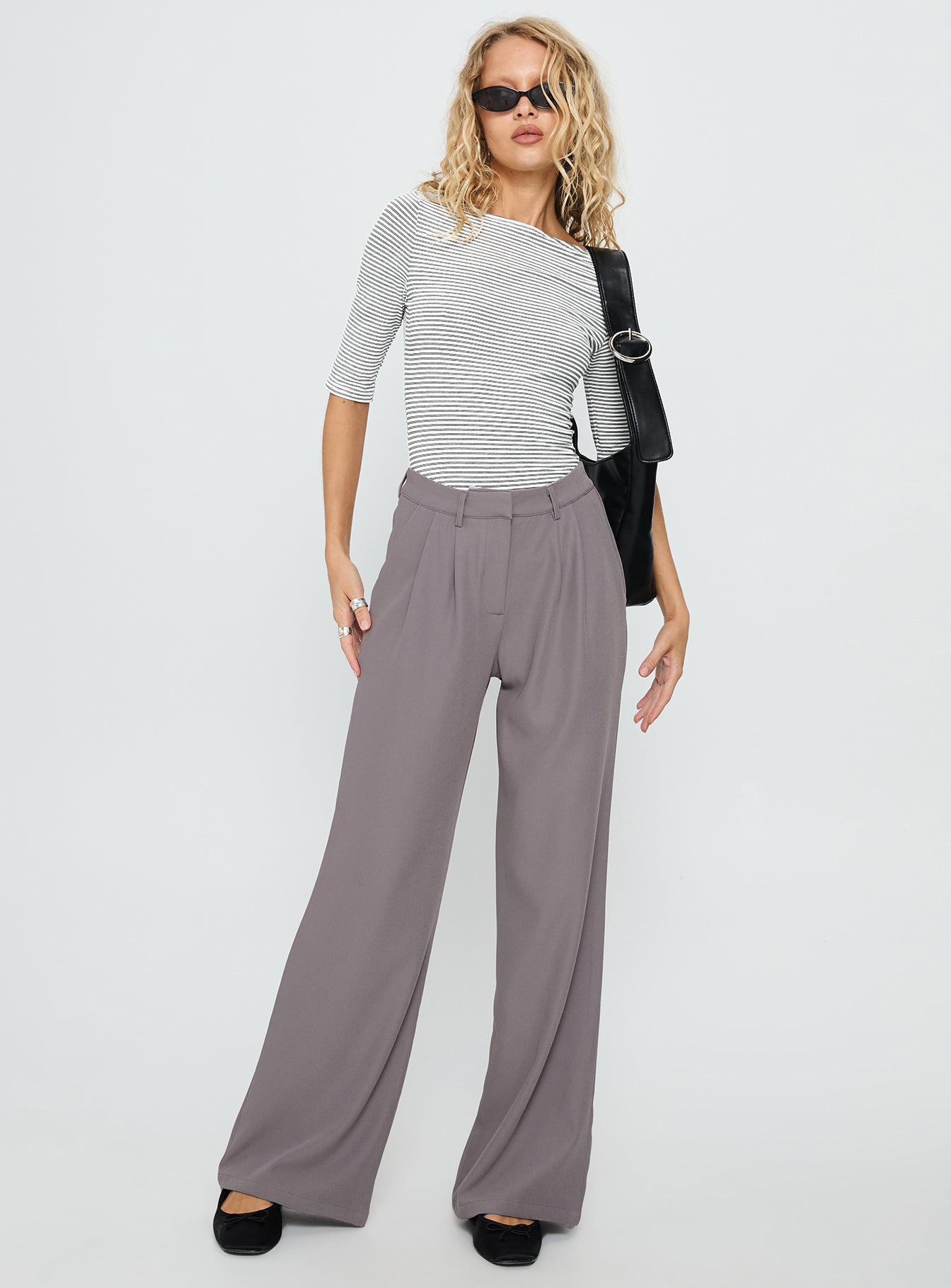 side view of model wearing Princess Polly Here One Moment 3/4 Sleeve Bodysuit Black / White Stripe Half Sleeve 