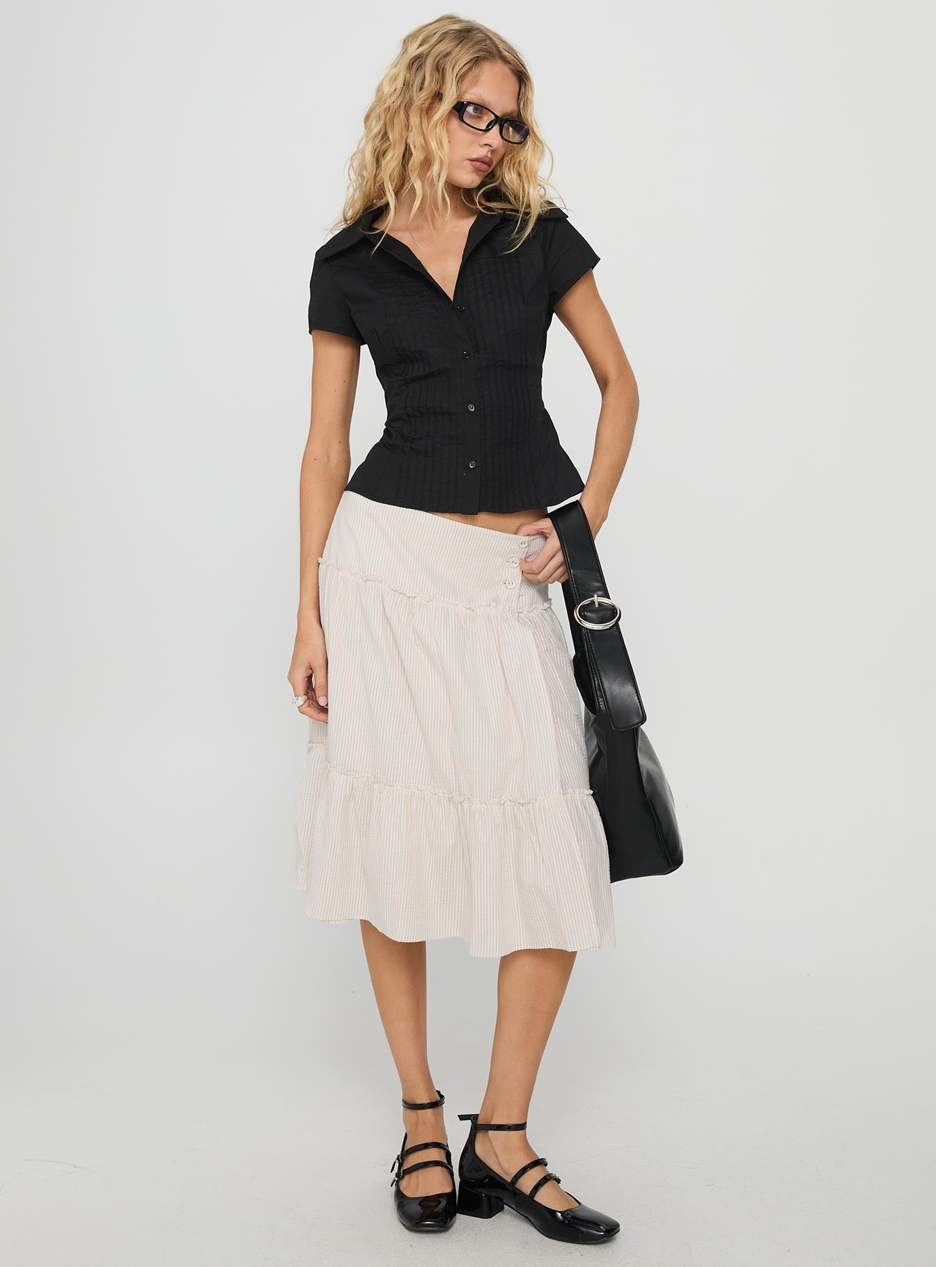   side view of model wearing Princess Polly Cascades Low Rise Midi Skirt Beige / White Stripe Midi Skirts 