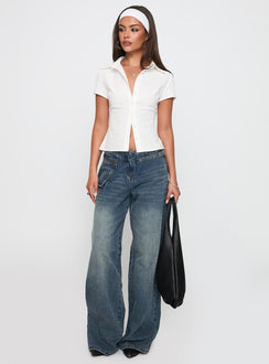 front view of model wearing Princess Polly Lift Off Button Up Top White Short Sleeves V-Neck 