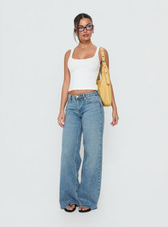 Featuring the Darla Low Rise Straight Leg Jean in Vintage Light Blue as womens jeans with low-rise front view of model wearing Princess Polly