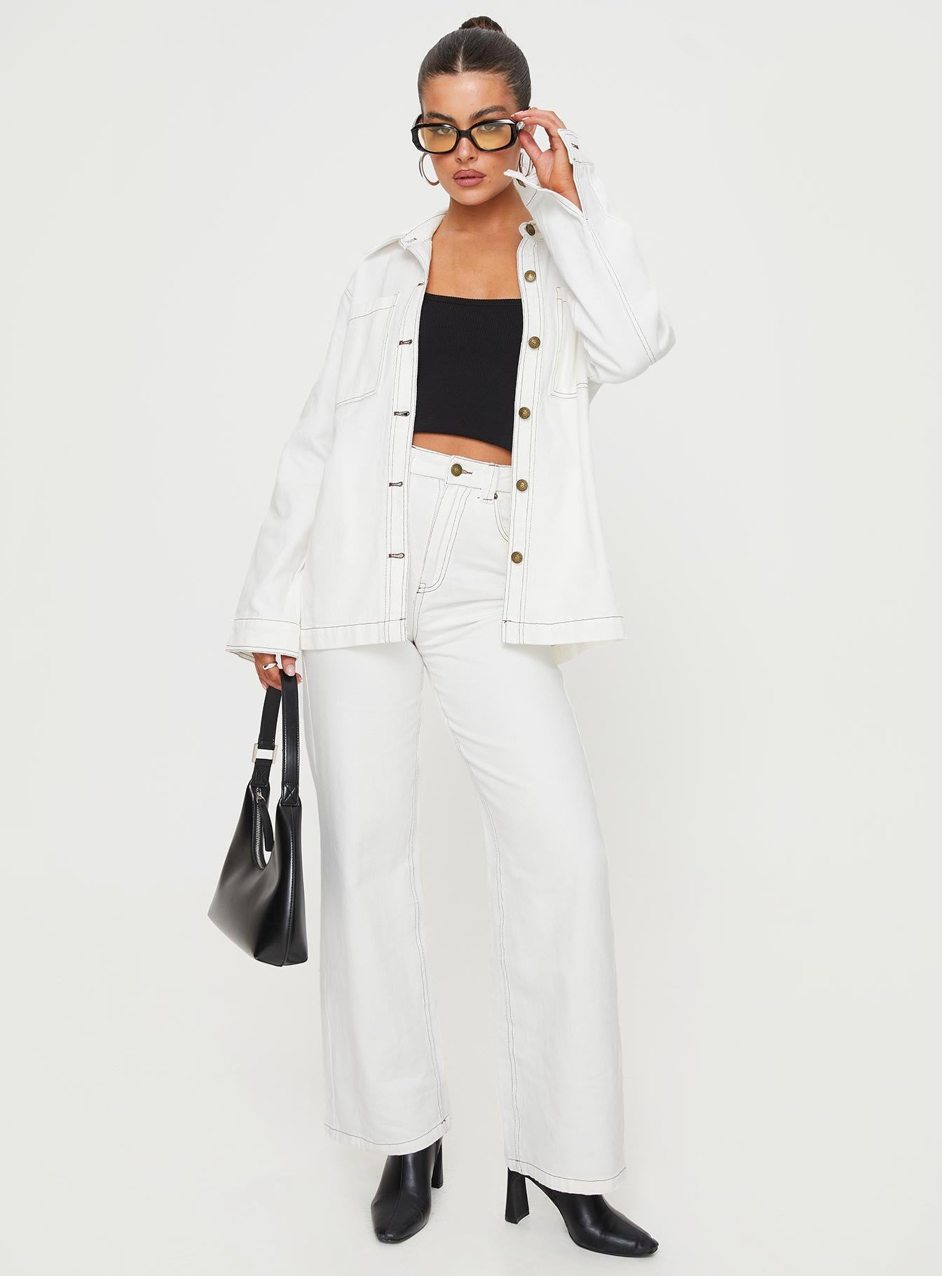 front view of model wearing Princess Polly Zephee Wide Leg Jeans Cream High Waisted 