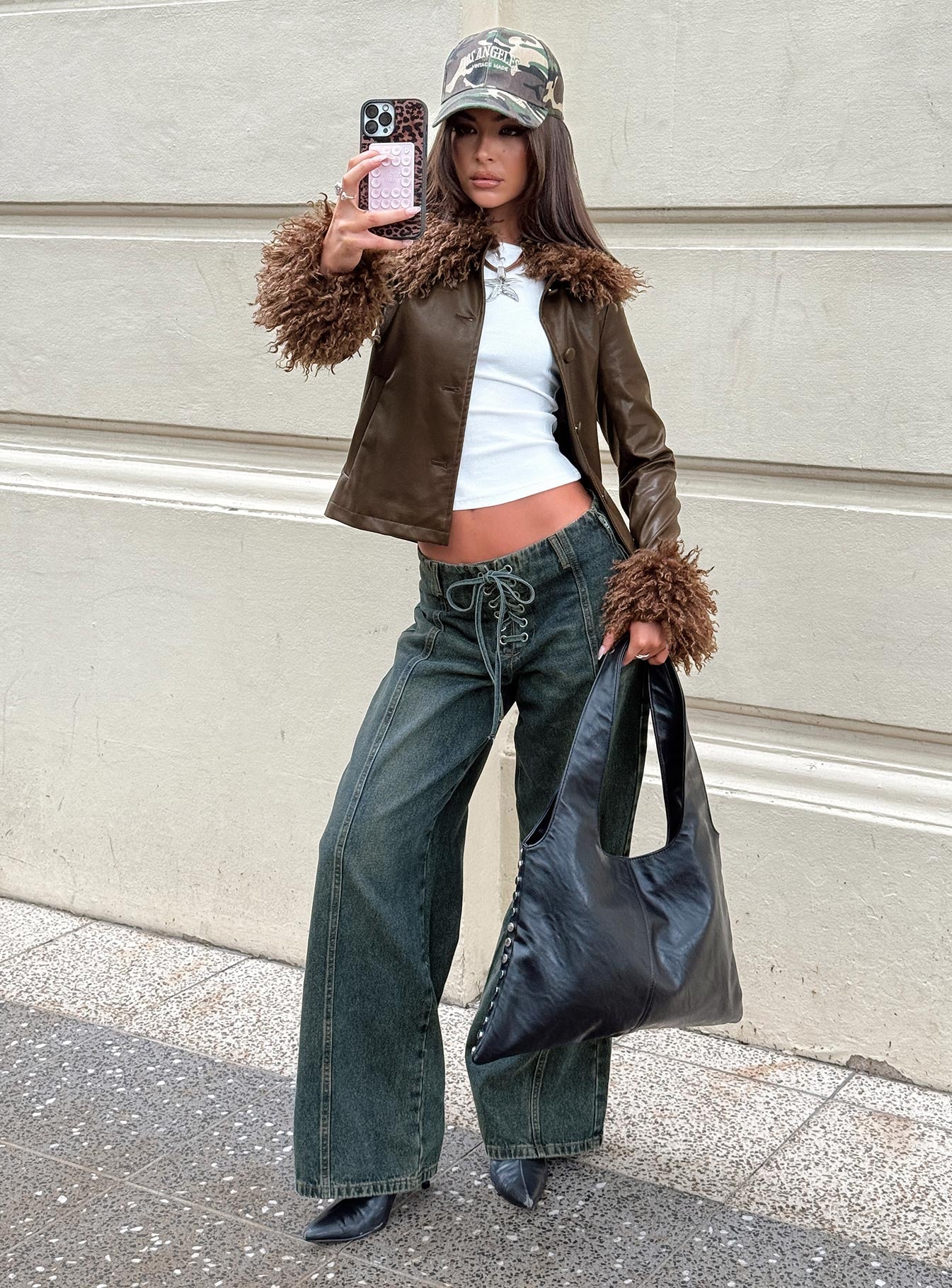 front view of model wearing Princess Polly San Mateo Tie Up Jeans Vintage Wash Low Rise Jeans 