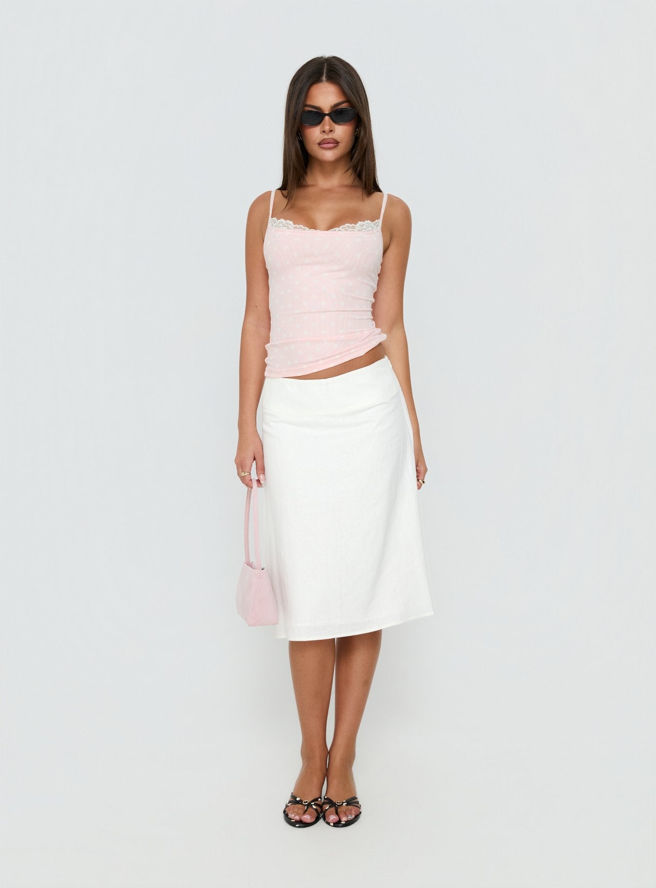 Showcasing the Such Delight Linen Midi Skirt in white for womens-skirts, designed with a fitted aline silhouette Princess Polly