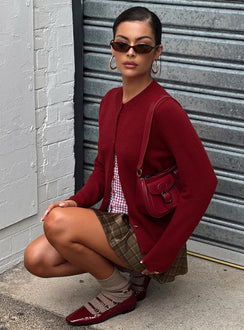 side view of model wearing Princess Polly Arica Button Up Knit Cardigan Red Long 