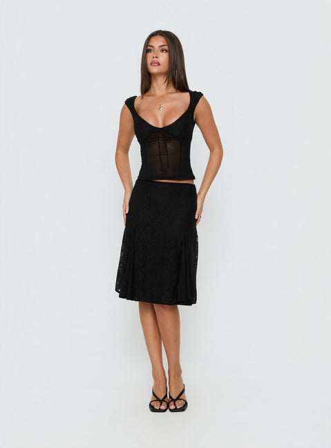Showcasing the Quani Lace Midi Skirt Black womens-skirts in midi length front view of model wearing Princess Polly