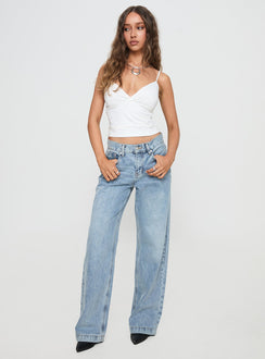 front view of model wearing Princess Polly Anelli Low Rise Straight Leg Jeans Light Blue Wash High Waisted 