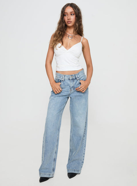 front view of model wearing Princess Polly Anelli Low Rise Straight Leg Jeans Light Blue Wash High Waisted 