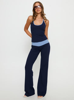 front view of model wearing Princess Polly Kobee Jersey Flare Pants Navy / Light Blue High Rise Pants 